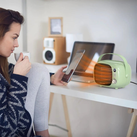 Fast Heating Desk Space Heater With Adjustable Thermostat, 800W/500W Ceramic Heating Fan for indoor use, compact green design.