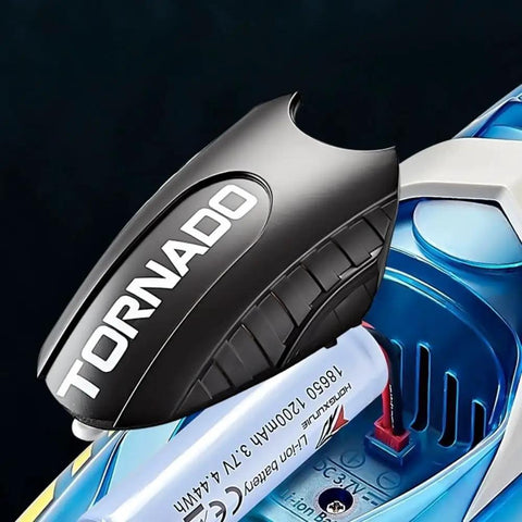 RC Boat With LED Lights For Kids Two Point Four Gigahertz Remote Control Racing Toy For Ages Eight To Twelve Perfect For Pools And Lakes Waterproof With Rechargeable Battery Dope Water Adventures For Boys And Girls close-up showing battery compartment and Tornado branding.