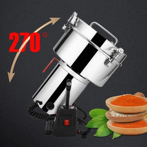 Electric Grain Grinder Superfine Mill 4500W Dry Flour Milling Machine with 270-degree rotation next to spices and herbs.