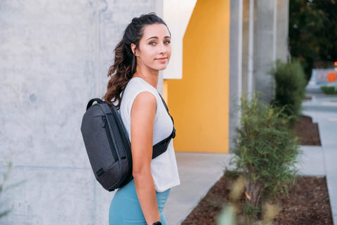 Woman wearing Lightweight 6L Crossbody Sling Bag For Travel And Everyday Carry, Anti Theft Pocket System, outdoors