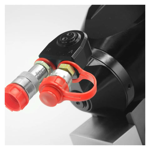 Close-up of Dead Nuts Accurate Hydraulic Torque Wrench's pneumatic connection with red safety caps for secure air powered use.