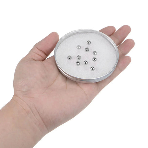 Smooth And Sturdy 40 Piece Pack 6 Millimeter Round Stainless Steel Spacer Beads Featuring 3 Millimeter Center Holes Slick Silver Finish in hand