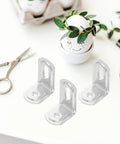 10 Pack Iron L Brackets With 90 Degree Rounded Corners for Shelves on white desk with crafting tools and decorative egg