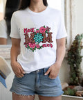 Woman wearing a t-shirt with Four Pack Iron On Transfers For T Shirts DTF Ready To Press Easy To Apply With floral and leopard design.