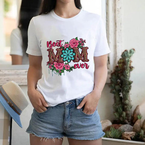 Woman wearing a t-shirt with Four Pack Iron On Transfers For T Shirts DTF Ready To Press Easy To Apply With floral and leopard design.