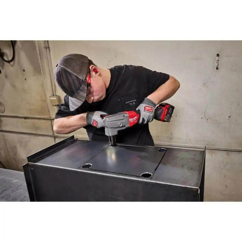 Person using 10 Gauge Nibbler With Variable Speed And Tool Free 360 Die Holder Rotation for clean cuts in mild steel
