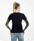 Back view of woman wearing Steampunk Seahorse Cooling Arm Sleeves With Thumb Holes UPF 50+ for sun protection.