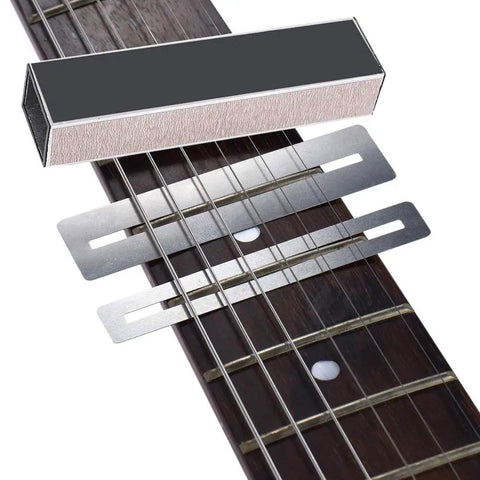Pro Grade Guitar Repair Kit with fret leveling beam on guitar neck with fret guards for electric bass and acoustic guitars