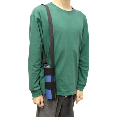 Person wearing green shirt with a bottle strapped in a blue holder over shoulder.