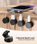 12 Pack 360 Degree Rotatable Spring Cable Clips With 1 Second Lock Adhesive Cord Holder organized on a wooden shelf
