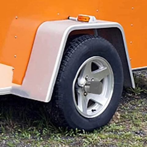 Trailer wheel bearing protector caps, 1.98-inch stainless steel, grey chromed dust covers (1 pair) on a trailer wheel