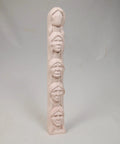 Learn To Carve A Native American Chief Face With A 12 Inch Hand Cast Resin Study Stick Kit showing carved faces for woodcarving practice.