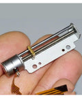 Hand holding DC 5V 30mm Linear Actuator 8mm Stroke 2 Phase 4 Wire Precision Stepper Motor Screw Drive for DIY projects