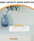 Heavy Duty Small Parts Organizer Box Built Tough Plastic Tool Caddy With Grippy Handle and Snappy Dividers on a table.