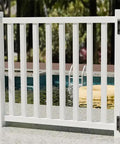 No Sweat Key Lockable Double Swinging Gate Latch on white pool fence for secure outdoor access with rustproof black hardware.