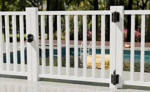 No Sweat Key Lockable Double Swinging Gate Latch on white pool fence for secure outdoor access with rustproof black hardware.