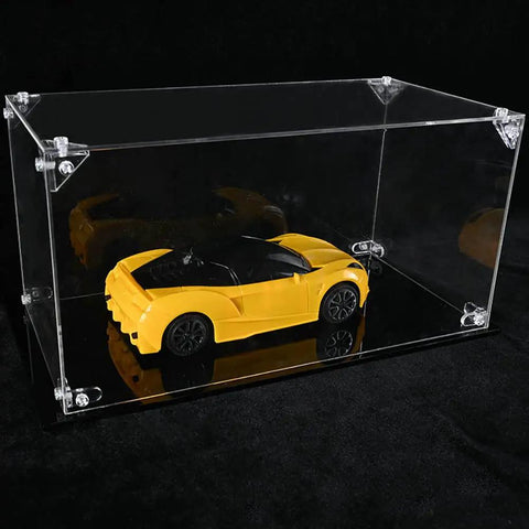 No Sweat Setup Acrylic Display Case Triangle Connector Seamless Assembly Clear Display Box with a yellow toy car inside.