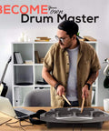 Man playing Portable Electronic Drum Kit With 7 Drum Pads, Hi Hat And Kick Bass Pedal, USB AUX, Desktop Tabletop Drum Set PTED06