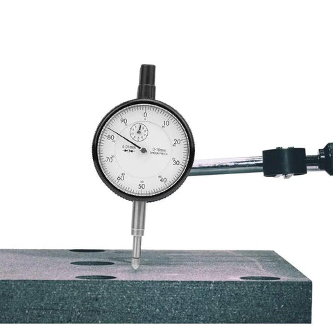 Rugged Pro Grade Dial Indicator Gauge with 0.01mm accuracy measuring a surface, aluminum alloy, shockproof, rust resistant