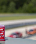 Storage fuel stabilizer bottle on ledge; product for long-term fuel freshness and engine protection, 10 oz for 25 gallons.
