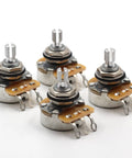 Four CTS 500k audio-taper guitar potentiometers with split shafts