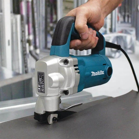 10 Gauge Sheet Metal Shear With Low Noise 81 dB, 2-Inch Cut Radius, Lock-On Switch in use for pro-grade metal cutting