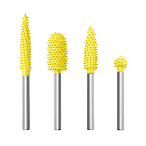 Four Piece Fine Grit Tungsten Carbide Rotary Burr Set With One Eighth Inch Shank for wood, plastic, and foam detail shaping.