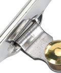 Close-up of stainless steel cowboy spur with copper cap buckle, part of the Stainless Steel Cowboy Spurs With Spur Straps And Copper Cap Buckle set.