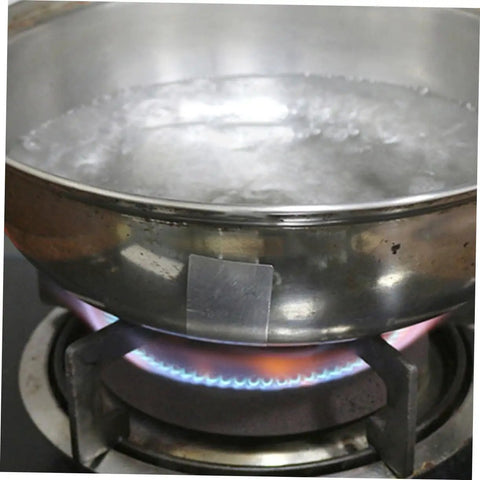 Aluminum Repair Patches For Cookware Leak Fix Tape For Pots And Pans Multi Purpose Reusable Easy To Apply Peel And Stick Patch in use.