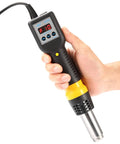 Hand holding Pro Grade Hot Air Rework Station With Digital Temperature Control And 600W SMD Desoldering Gun showing LED Display.