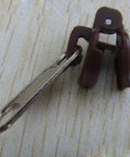 Close-up of a single black zipper slider from Six Black Universal Zipper Repair Kit Sliders Instant Fix for Jackets Bags and Pants Replaces Damaged Zippers Quickly With Durable Fasteners That Last