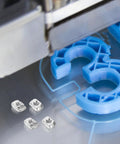 Kick Your 3d Printer Game Up With 40 Piece M3 T Slot Nuts Made From Tough Carbon Steel That Slide Smoothly Into Channels For Super Fast Mods And Upgrades On Your CNC Router Or Custom Builds - close-up of M3 T Slot nuts on a 3D printer platform.