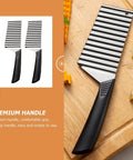 Front view of a two-piece stainless steel crinkle fry cutter with black non-slip handles for potatoes, carrots and fruits