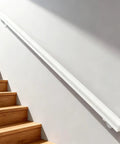 Solid Pine Wood Wall Mount Grab Bar, Tough As Nails Non Slip Staircase Handrail, Heavy Duty Safety Rail For Elderly And Families, Smooth Finish Indoor Outdoor Guardrail With Secure Brackets, 3 Ft Length For Home And Backyard installed along wooden staircase.