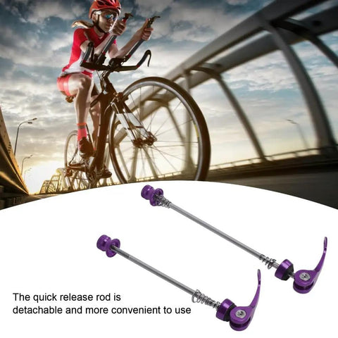Cyclist on road with 2 Pack Bicycle Quick Release Skewers Aluminum Alloy Front And Rear Wheel Axle Clips 100mm 135mm Purple below