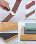 Hand using Actual Grit Whetstone Set With 400 1000 3000 8000 Grits For Knife Sharpening; shows leather strop and bamboo base.