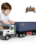 Child playing with Nine Channel Remote Control Semi Truck With Trailer 24 Scale RC Container Carrier Toy, 1:24 scale, with remote control.