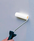 Dead On Smooth Mini Sponge Paint Roller Covers for Flawless Furniture Touch Ups and Interior Wall Painting, compact foam roller in use.