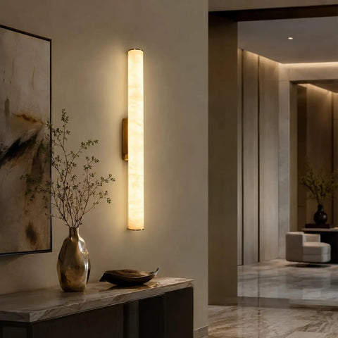 JCQASRT 19.69 in Modern Wall Sconce, 3-Color Changing LED Wall Light Fixture, hardwired brass wall lamp illuminating a hallway.