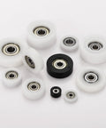 Meccanixity 4 Pack White Roller Idler Bearing Pulley, 8 X 40 X 10mm Plastic Sliding Conveyor Nylon Wheel Track Wheel For Furniture Hardware And Mobile Door Accessories, Smooth Quiet Performance, various sizes of plastic wheels.