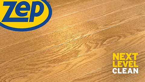 Clean hardwood floor showcasing the shine, featuring Zep branding; ideal for showcasing Ready To Use Hardwood And Laminate Floor Cleaner No Drama Stain Scuff Eraser Fast Drying No Rinse Formula Polyurethane Friendly Instant Shine Boom Easy Peasy Application.