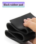 Heavy Duty Black Rubber Shop Mat For Machinery And Workbench Gear Oil Resistant Non Slip Base Pad held in hand.