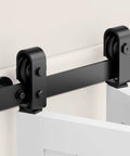 Durable 48 Inch Bifold Barn Door Hardware Kit For 44 Inch Closet Doors Easy Install And Quiet Operation Bi Fold Track System With J Shape Top Mount Rollers Black Powder Coated Steel For Smooth Reliable Sliding And Modern Look, close-up view of black track and rollers.
