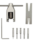 Pinion Gear Puller Kit For RC Motors And Pinion Removal shown with tools, pins, and components on display