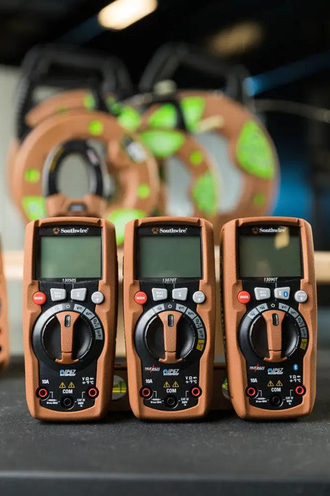 Three ResPro TRMS BT Bluetooth Multimeter With App Connectivity IP67 Waterproof Housing True RMS Accuracy on a table