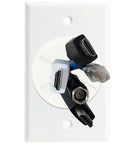 Slick Grommet Wall Plate For In-Wall Cable Management And Wire Concealment To Clean Your Rig Via Hdmis Ethernet And Speaker Cable Routing Through Walls Making Room And Showcasing Smooth Durable Abs White Finish with HDMI and Ethernet cables.
