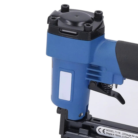 Close-up view of Heavy Hitter Pneumatic Brad Nailer, showing aluminum frame and grippy rubber handle for woodworking.