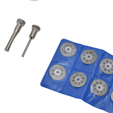 Forty Four Piece Cutting Wheel Set With Diamond Cutter Wheels And Circular Saw Blades For Rotary Tools displayed with discs and spindles