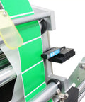 Close-up of Fully Automatic Desktop Top And Side Labeler Machine With Adjustable Speed Control Fits Bottle Sizes From 1.57 To 3.9 Inches.