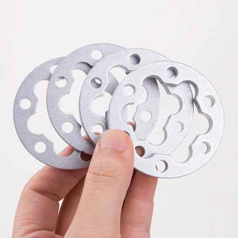 4 Pcs Aluminum E Bike Disc Brake Spacer Kit 6 Hole Universal Rotor Washers 2mm and 5mm shown in hand